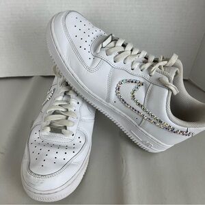 Nike White Sneakers with Silver Accents